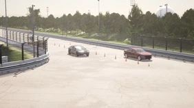 Image of two vehicles on the CARISSMA test track