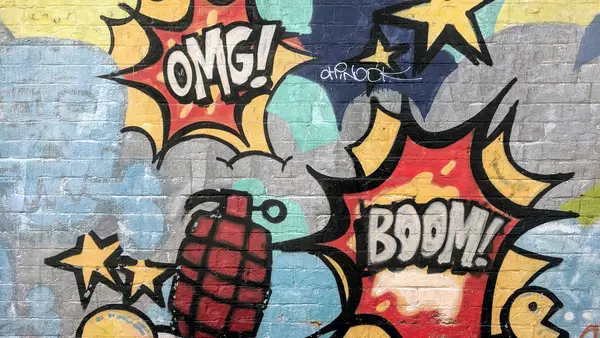 Wall with graffiti - OMG - BOOM